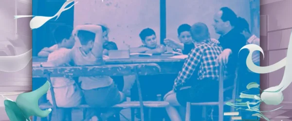 Immagine di Don Milani con studenti